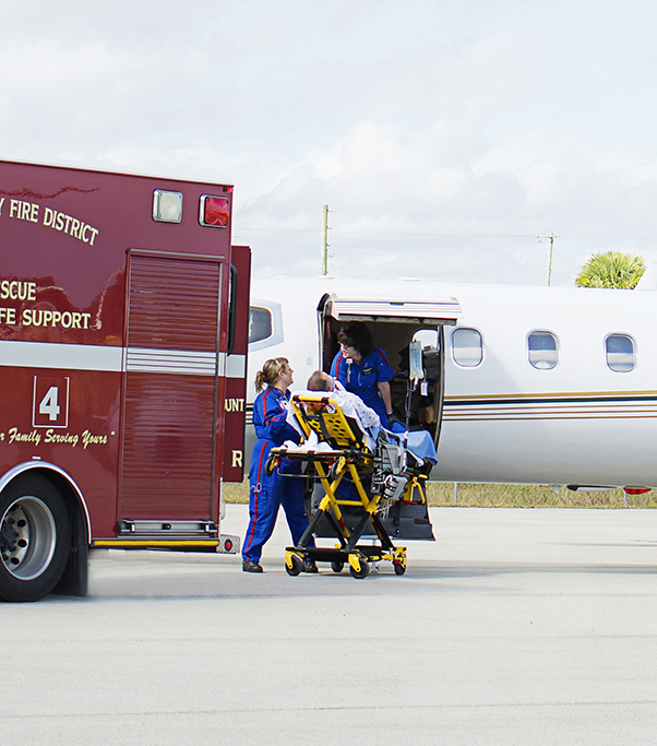 Fixed wing crew loading patient